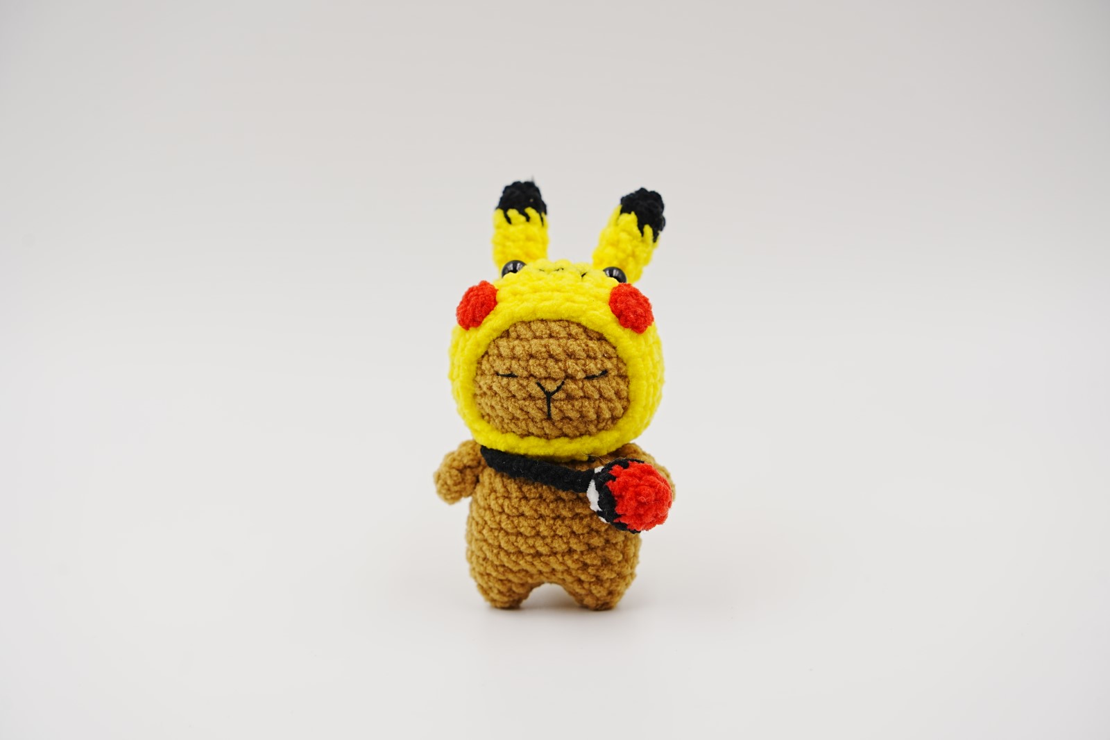 crochet-capybara-016 Yellow Hood Capybara - Image 1